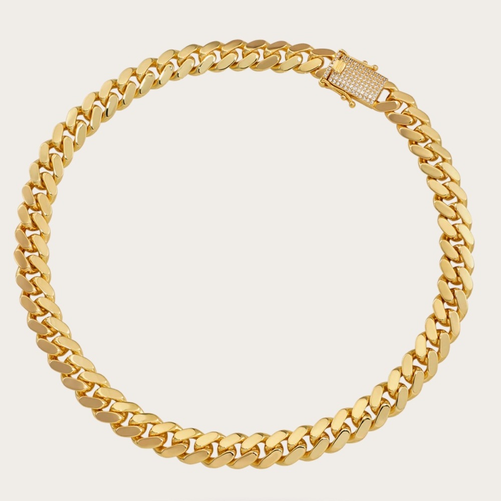 Never worn gold plated Ice Link Cuban chain necklace with white gemstone closure
